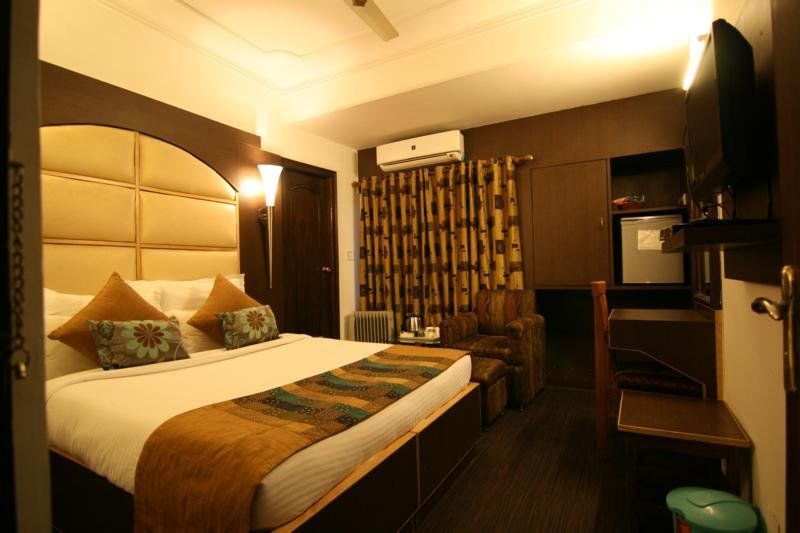Hotel Sri Nanak Continental Делхи Стая снимка